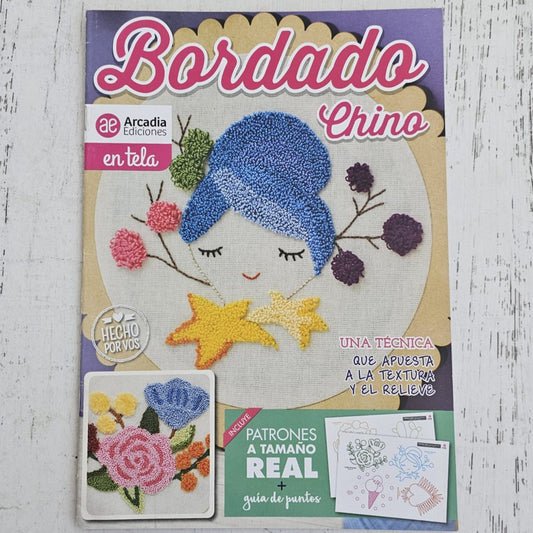 Revista bordado aguja mágica con hilo