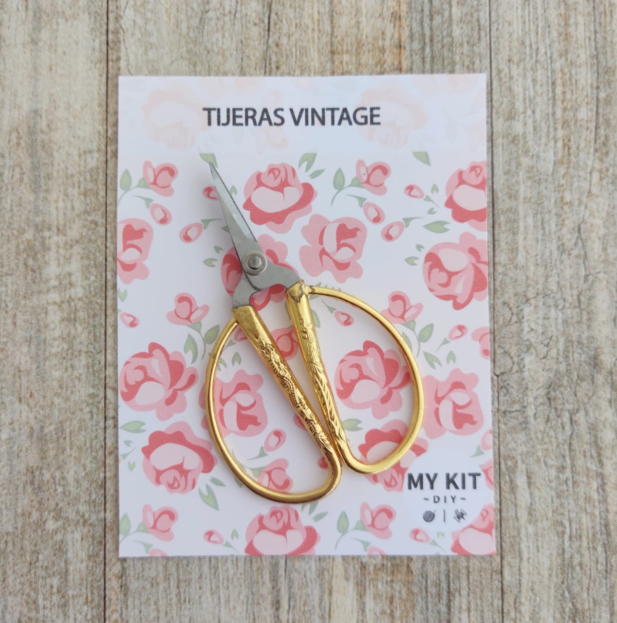 Mini tijera dorada colección